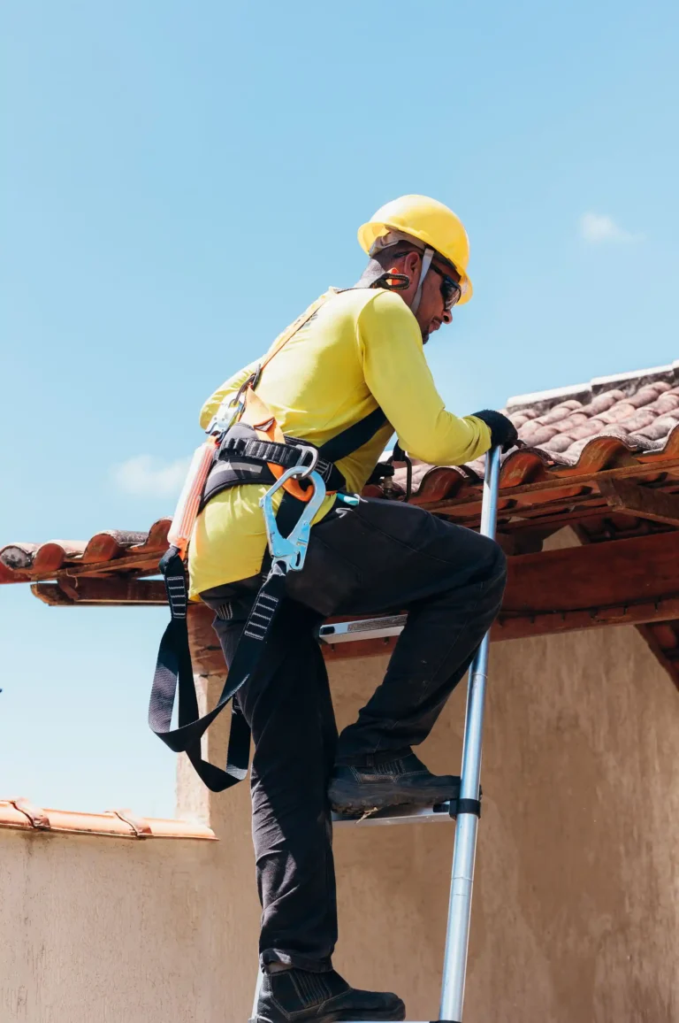 Professional cleaner in proper safety gear and equipment